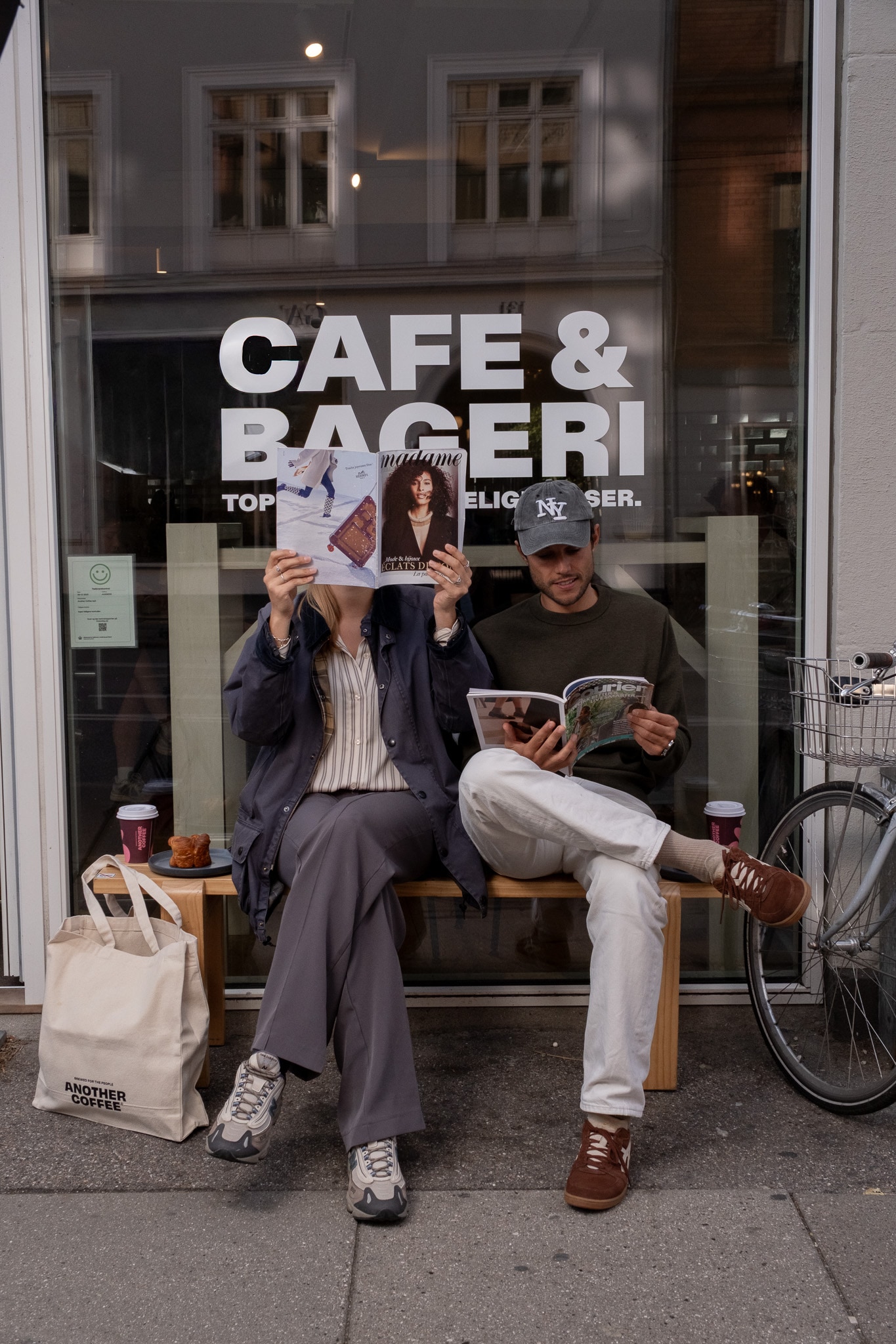 A coffee break on the bench outside our café on Gammel Kongevej